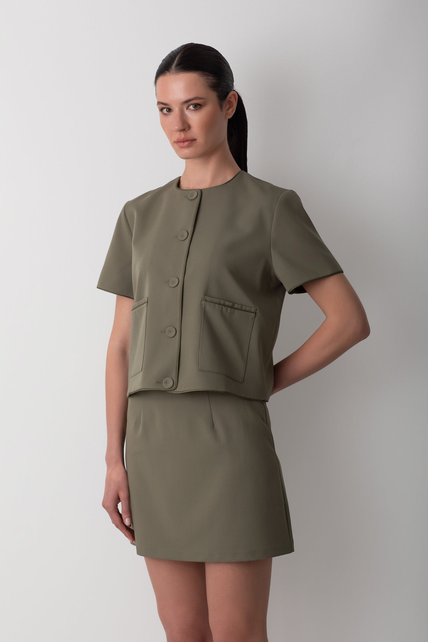 MINI OIL GREEN SKIRT