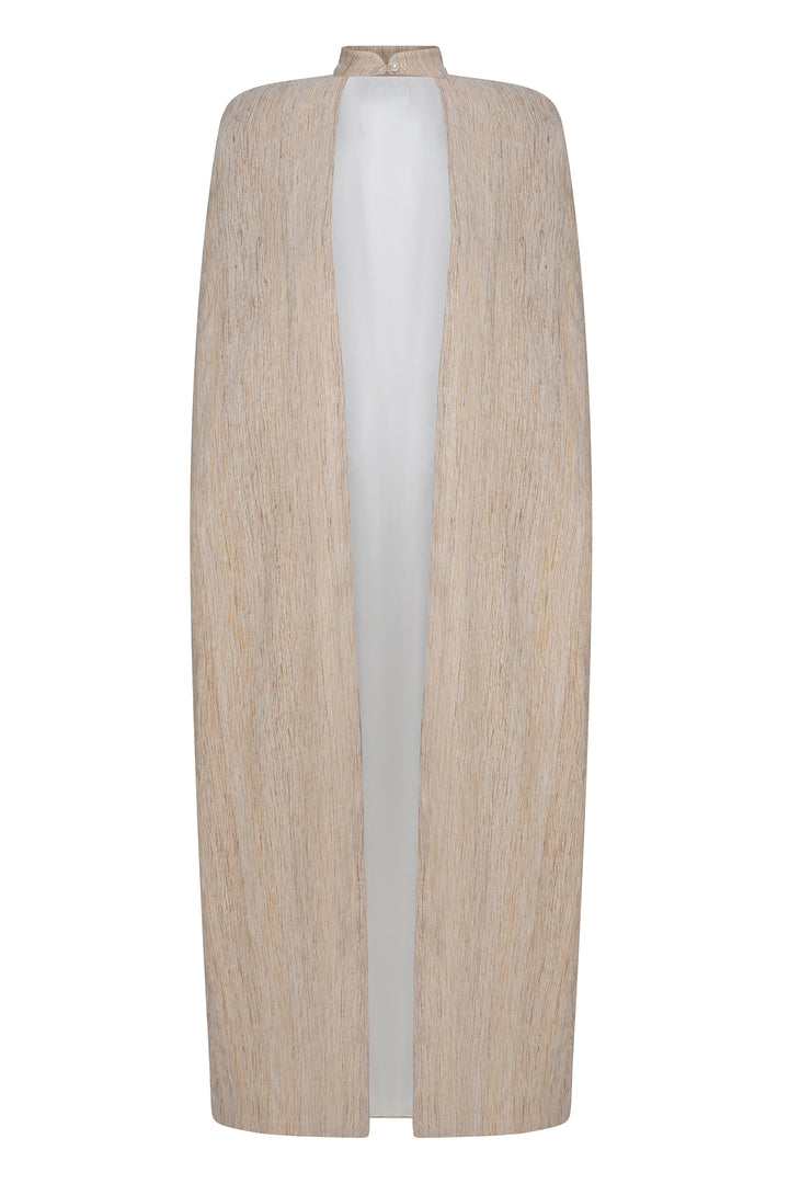 Parel logolu krem renk hint ipeği davet elbisesinin zarif pelerini